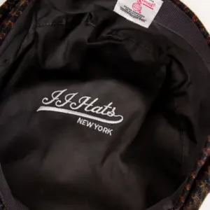 JJ Hats 8-Panel Cap Harris Tweed Innenansicht Logo-Bestickung