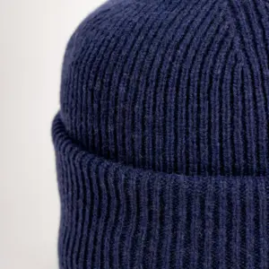 Grote Umschlagmütze aus recycled Kaschmir