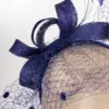 Fascinator mit Schleier und Federn