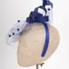 Fascinator mit Schleier und Federn