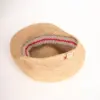 Bedacht Cap aus Stroh