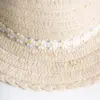 Faustmann Kinder Strohhut mit Blumenband Faustmann Kinder Strohhut mit Blumenband