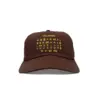 VISIT Cap Malaysia Ansicht frontal mit gelbem Stick, Cap mit tamilischem Alphabet