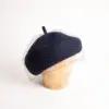 McBurn Baske aus Wollfilz mit Schleier McBurn Baske aus Wollfilz mit Schleier